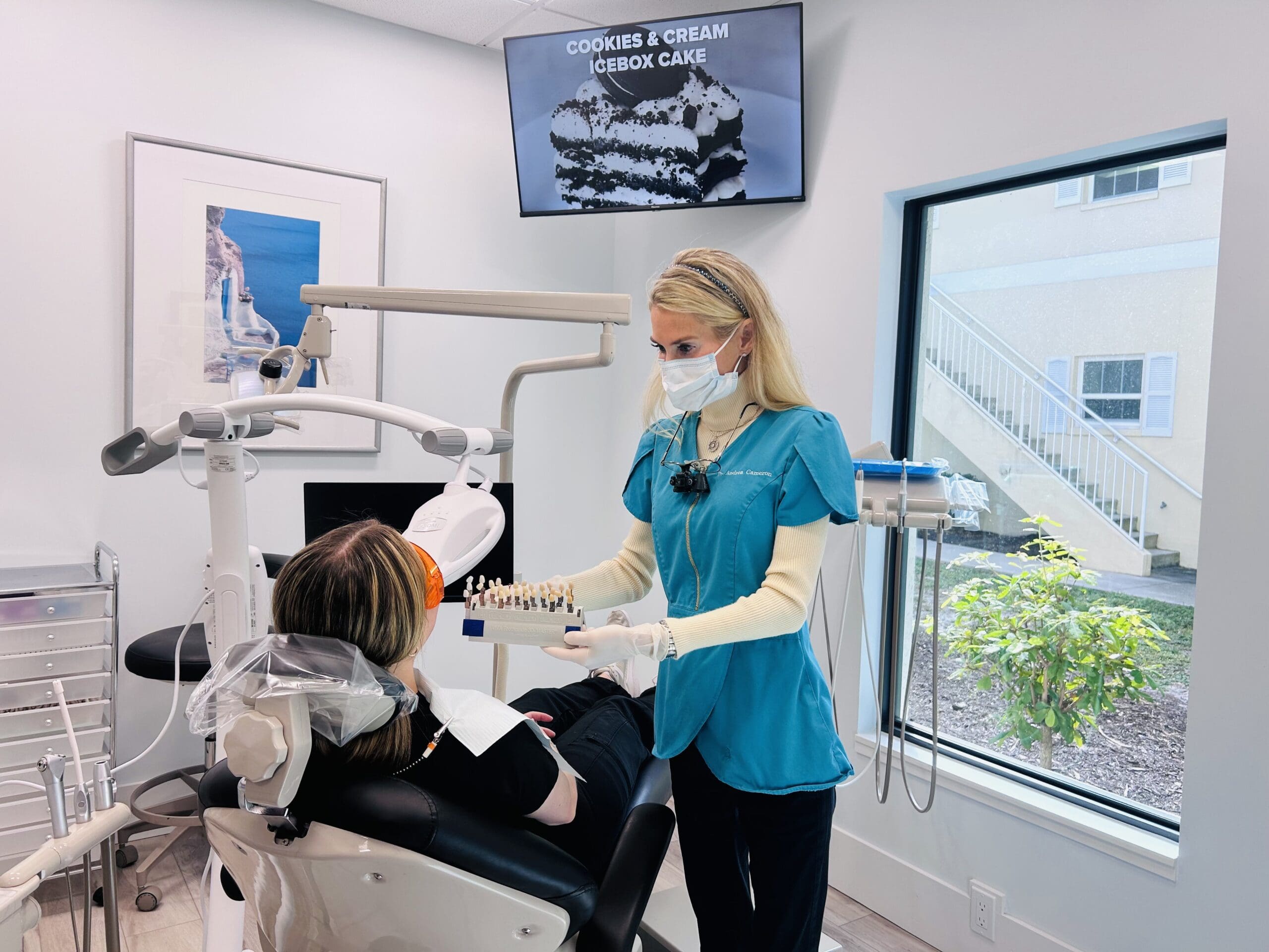 IMG_3648 Dr. Cameron is with one of her patients, showing her the options for getting Zoom whitening