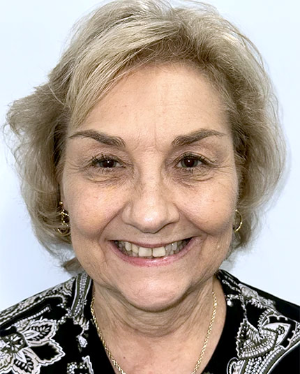 Linda-Ouimet-Before-Face-adj Full-face picture of Linda before Dr. Cameron began her dental work.